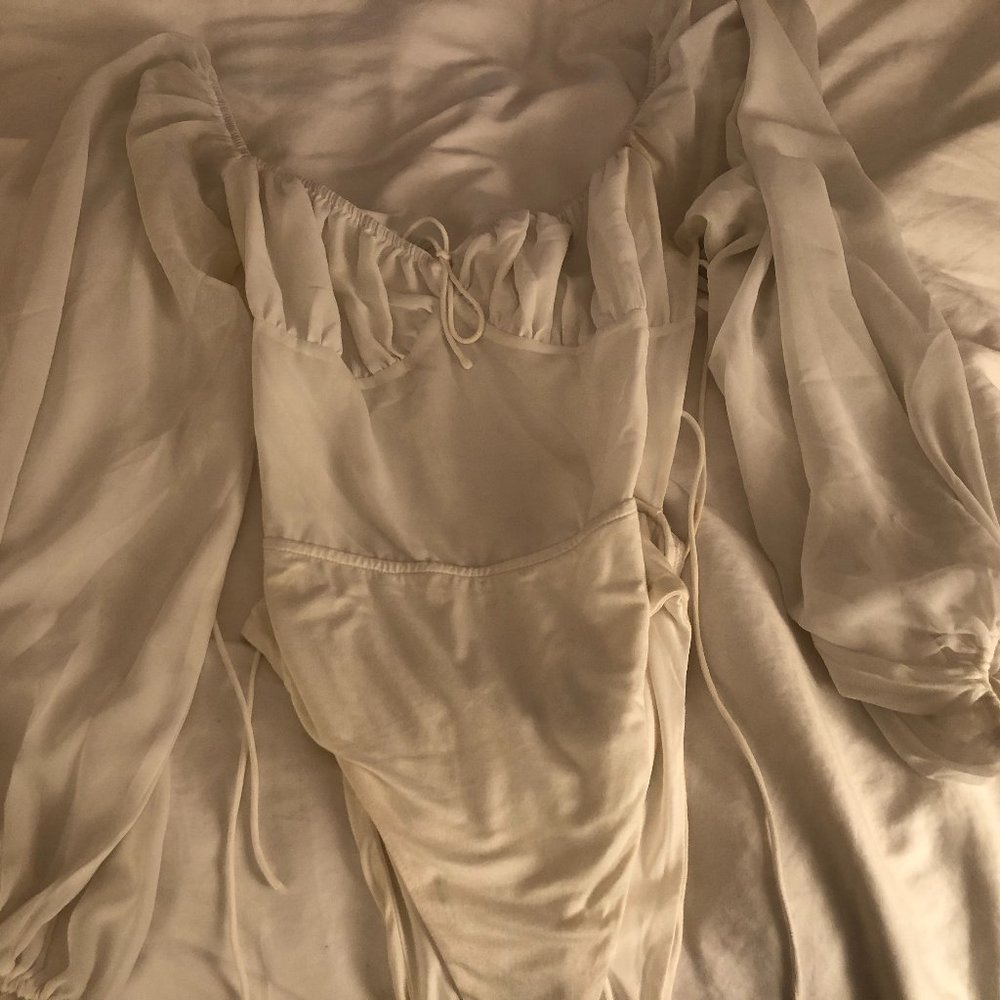Sorrell Bodysuit in white, size medium.
